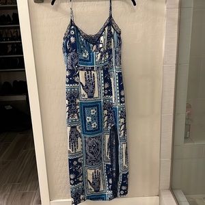 Zodiac strapped dress.  Slit on left side.